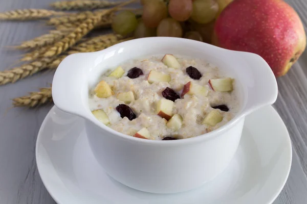 Healthy Breakfast Oatmeal Milk Apple Raisins Grey Wooden Background — Stock Photo, Image