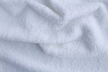 Tekstil arka planı. Beyaz havlu. Üst te. Kopya alanı. Closeup.