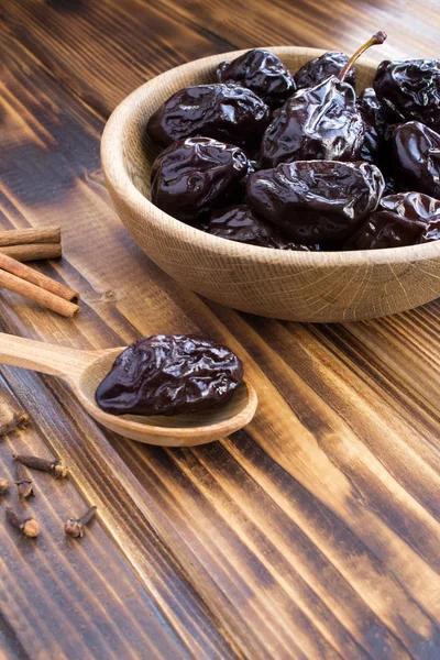 Pickled Plums Brown Bowl Wooden Background Fermented Product Location Vertical — Stock Photo, Image