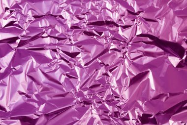 Leylak gibi parlak bir arka plan. Folyo. Uzayı kopyala Yakın çekim..