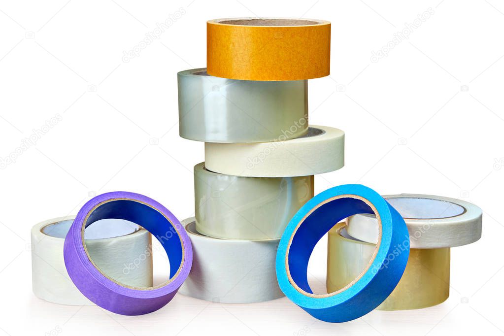 Transparent duct tape for packing and painter's masking tape in small heap isolated on white background, with saved path.