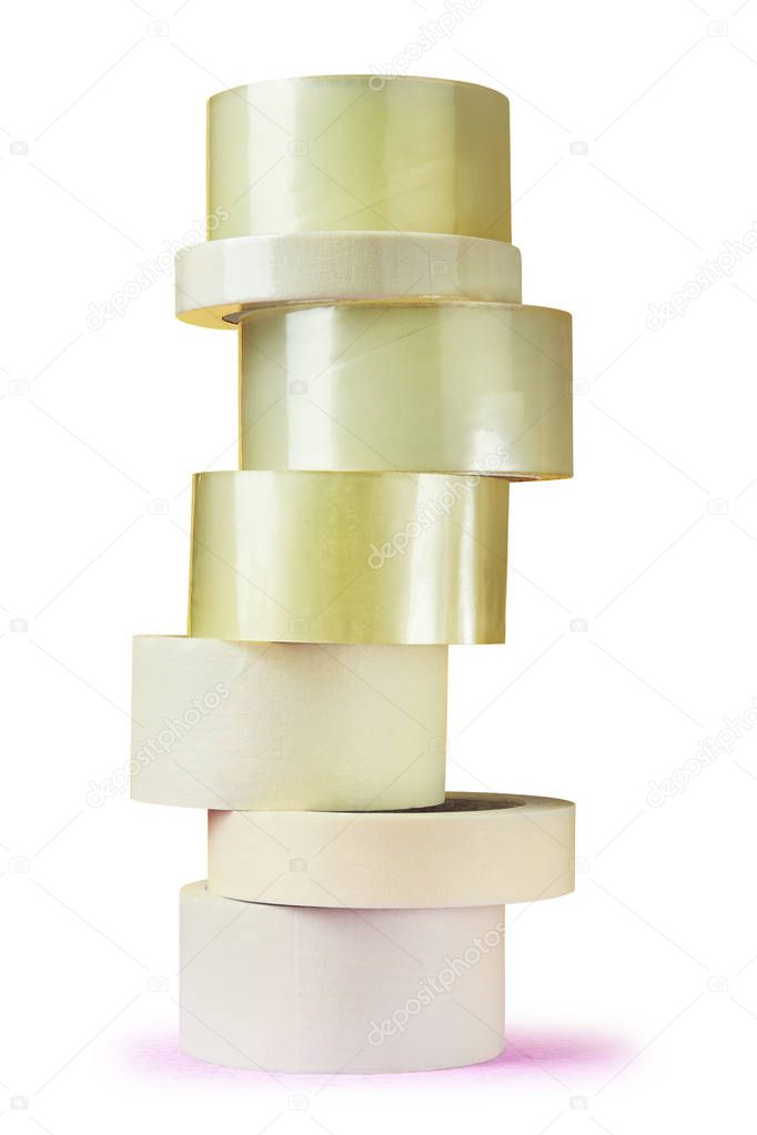 Set of scotch packing tape is stacked in form of tower, isolated on white background, with saved path.