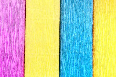 Dört farklı renkli krep kağıt rulo için arka plan dokusu oluşur.