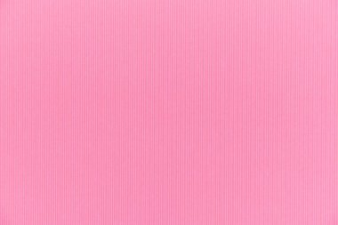 Tam kare zemin pembe renkli doku oluklu mukavva levha.