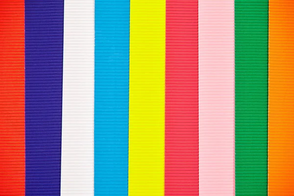 Arka plan doku oluklu kağıt az çok renkli çizgili.