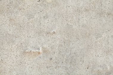 Gri beton yüzey mikro çatlaklar, küçük delikler ve kum, arka plan için soyut doku kapanımlar.