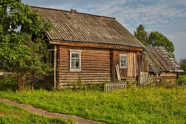 Peasant\'s log hut,  wooden house, cabin built with logs.