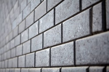 Polietilen, gri tuğla, sığ derinlik-in tarla yan görünüm tuğla.