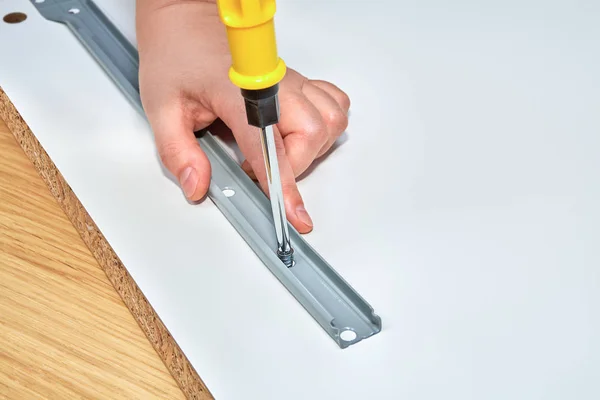 Handyman Puts Together Drawer Runner Wooden Table Made Particle Board — Stock Photo, Image