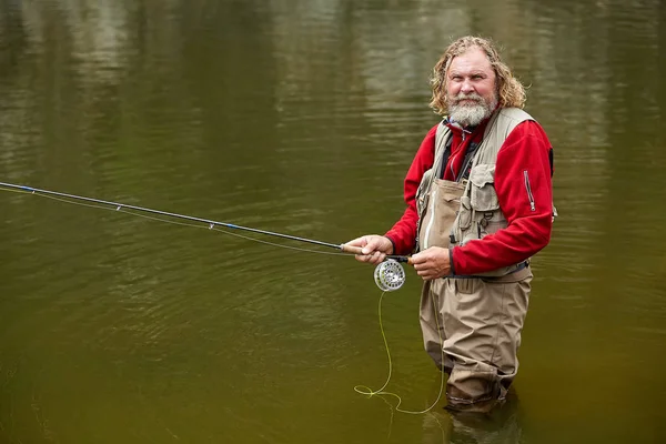 Flyfishing in forest during eco-tourism. — Stock Photo, Image