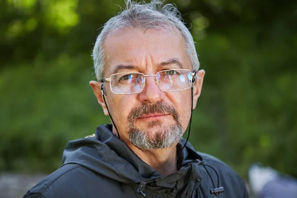 The serious face of an educated man 56 years old. — Stock Photo, Image