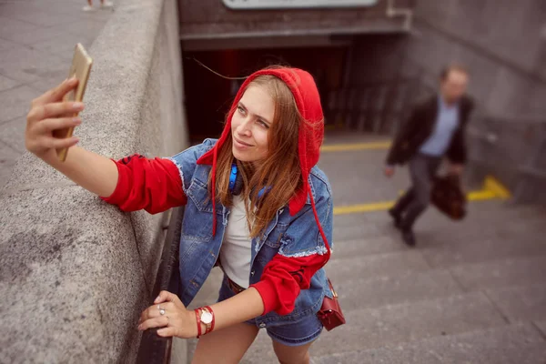 Woman Red Hoodie Taking Selfie Entrance Subway Using Smartphone Young — Stock Photo, Image