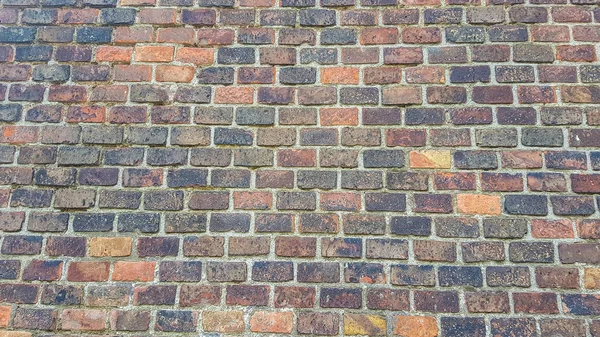 Red Vintage Brick Wall Wallpaper Background Texture.Close Up of Colorful Red Bricks Pattern