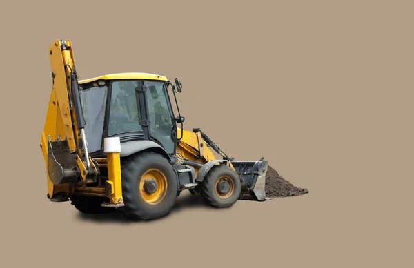 Kahverengi arkaplanda inşaat tekerleği yükleyicisi