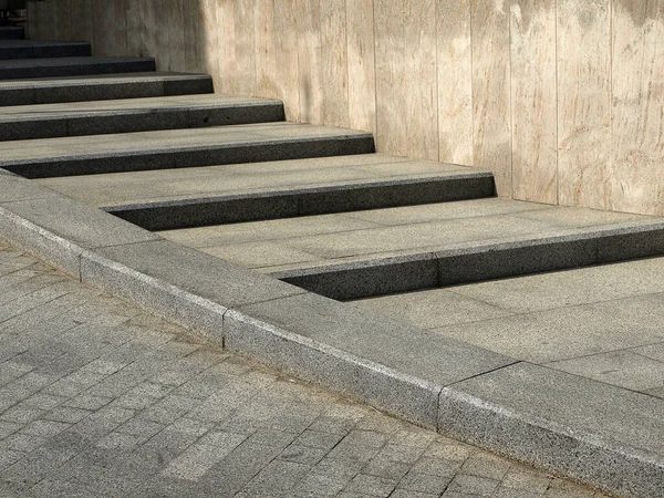 Cobbled Street and Curved Stone Staircase