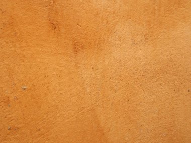 Kaba yanmış turuncu ochre renkli dokulu lekeli duvar arka plan