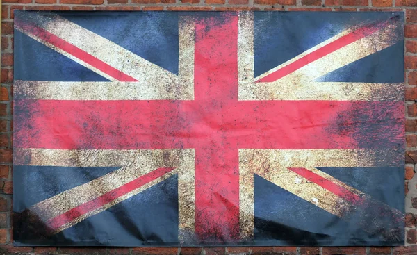 Ένα Παλιό Βαμμένο Βρώμικο Σωματείο Βρετανική Σημαία Σκούρες Τσαλακωμένες Άκρες — Φωτογραφία Αρχείου