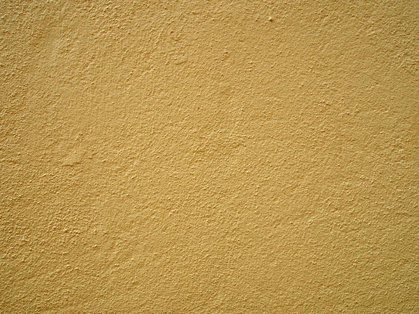 Uma Parede Texturizada Concreto Amarelo Pálido Pintado Uma Luz Brilhante — Fotografia de Stock