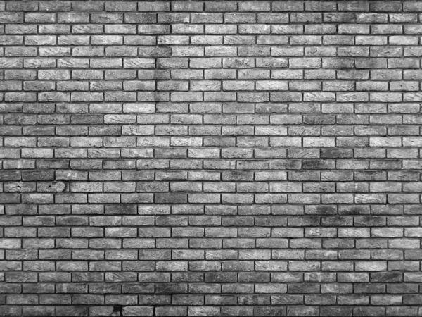 Black brick wall repeating background — Stock Photo, Image