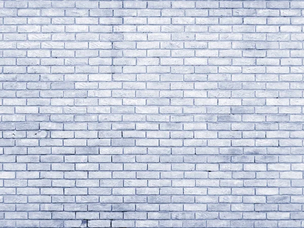 Bleke blauwe oude bakstenen muur met herhalend patroon — Stockfoto