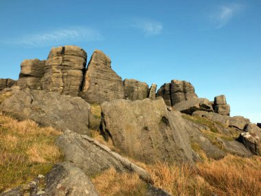 large rugged gritstone outcrop at the bridestones a large rock formation in west yorkshire near todmorden clipart