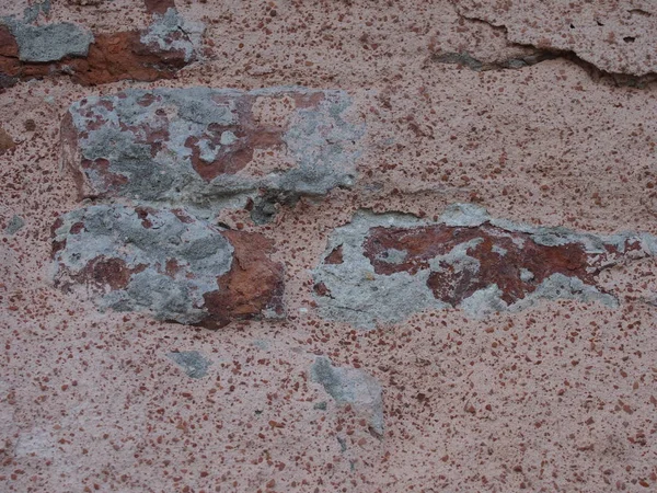 Detalle de una antigua pared de cemento y ladrillo — Foto de Stock