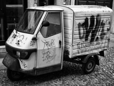 painted delivery service tricycle