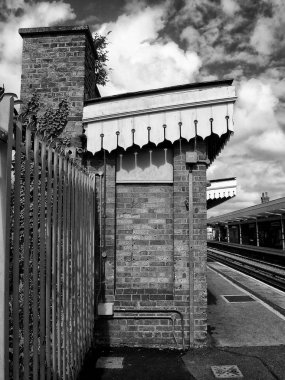 black and white view of railway station