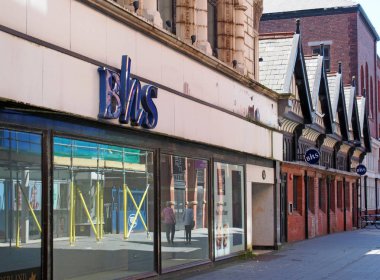 a closed british home stores shop in chapel street southport empty since bhs went into liquidation in 2016 clipart