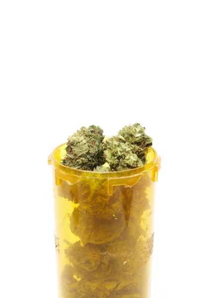 Marihuana Żółtej Butelce Tworzywa Sztucznego Widok Bliska — Zdjęcie stockowe