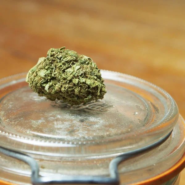 Marijuana Buds Glass Jar Close View — Stock Photo, Image