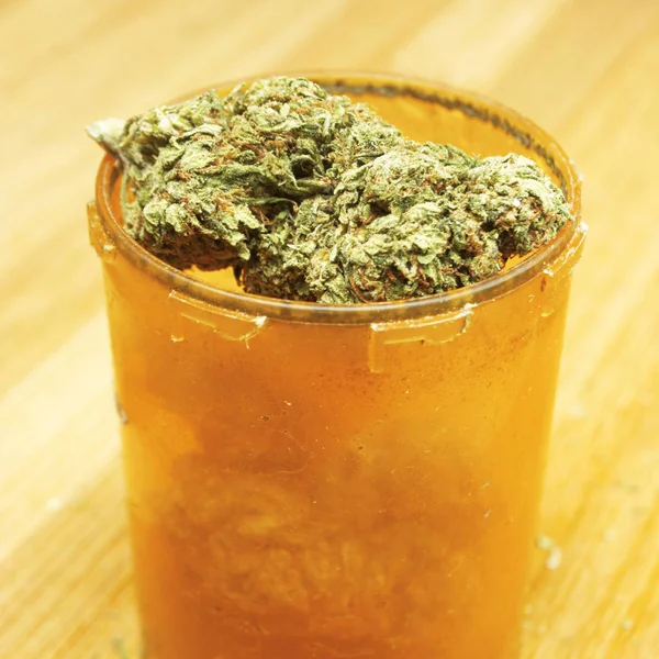 Marijuana Buds Plastic Bottle Close View — Stock Photo, Image