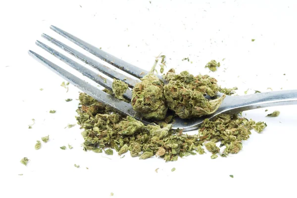 Närbild Marijuana Och Metall Gaffel Vit Bakgrund — Stockfoto