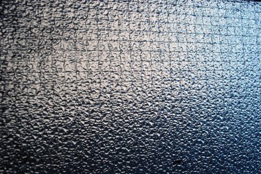 Damlalı desenli metalik yüzey