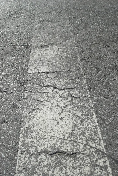 Close View Grey Cracked Asphalt Road White Dividing Line — Stock Photo, Image