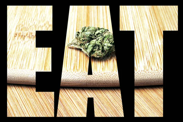 Eet Belettering Zwarte Achtergrond Met Marihuana — Stockfoto