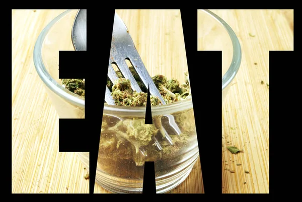 Eet Belettering Zwarte Achtergrond Met Marihuana — Stockfoto