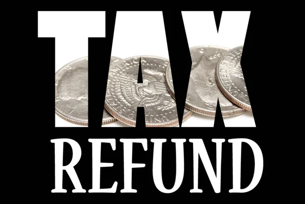 Tax refund inscription with coins inside on black background