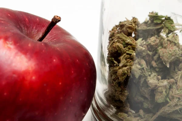 Marijuana Glass Jar Red Ripe Apple Drug Addiction Concept Medical — Stock Photo, Image