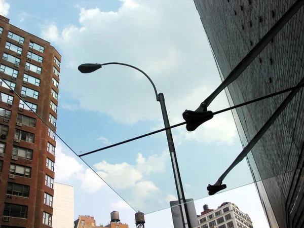 Bottom view of street lights in daytime city