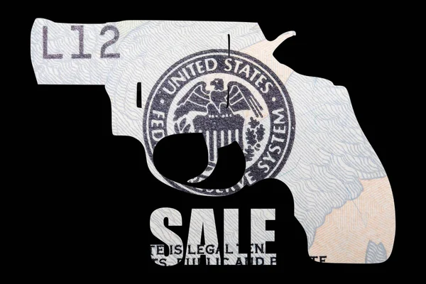 Gun and Money. Representing Shootings in America. Shape of Gun over detail of United States of American Dollar Bill and sale inscription
