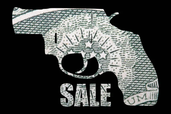 Gun and Money. Representing Shootings in America. Shape of Gun over detail of United States of American Dollar Bill and sale inscription