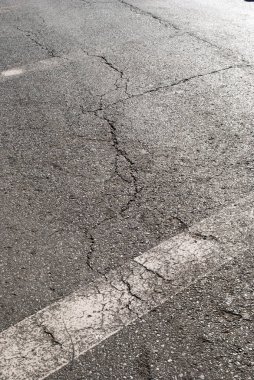 Işaretleri ile grungy dokulu yol yüzeyi