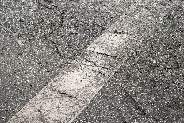 Грязное Текстурированное Дорожное Покрытие Следами — стоковое фото