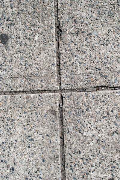 Grey concrete floor tiles surface