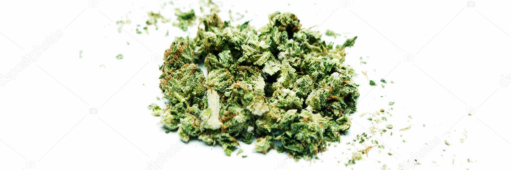 Pile of dried marijuana isolated on white background