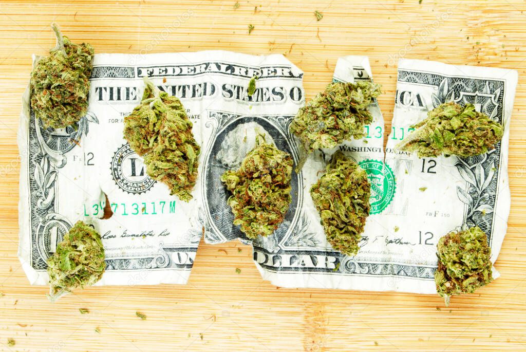 Marijuana and Money on background, close up