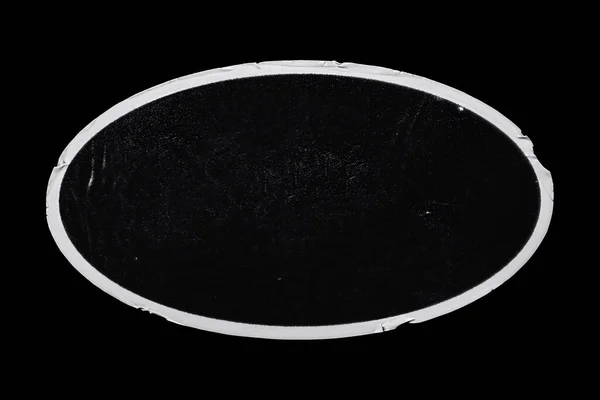 黒の背景に隔離された古い黒の皮のステッカーラベル楕円形の楕円形のグラウンジダーティダスティ表面 — ストック写真
