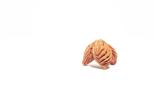 Obstkerne Auf Weißem Hintergrund Künstlerische Formgestaltung Nektarine Pfirsich Samen — Stockfoto