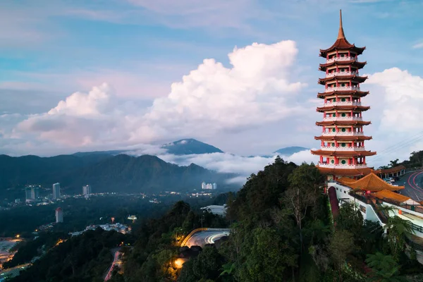 View of the Pagoda in the morning with low level cloud and hills